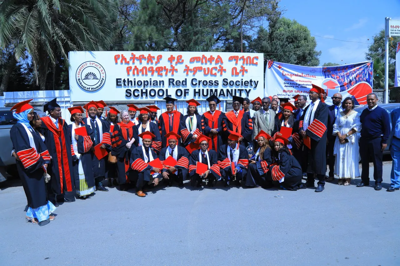 Graduates and faculty celebrating a graduation ceremony at the Ethiopian Red Cross Society School of Humanity.